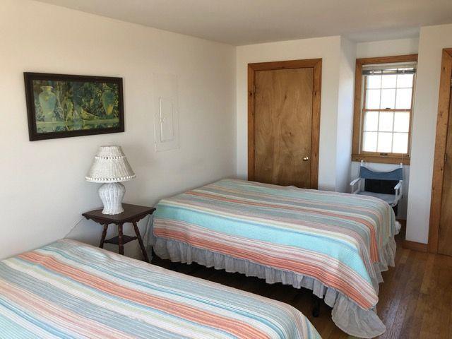 35 Bayberry Lane Eastham, MA 02642 - Photo 20 of 42 a bedroom with bed and window