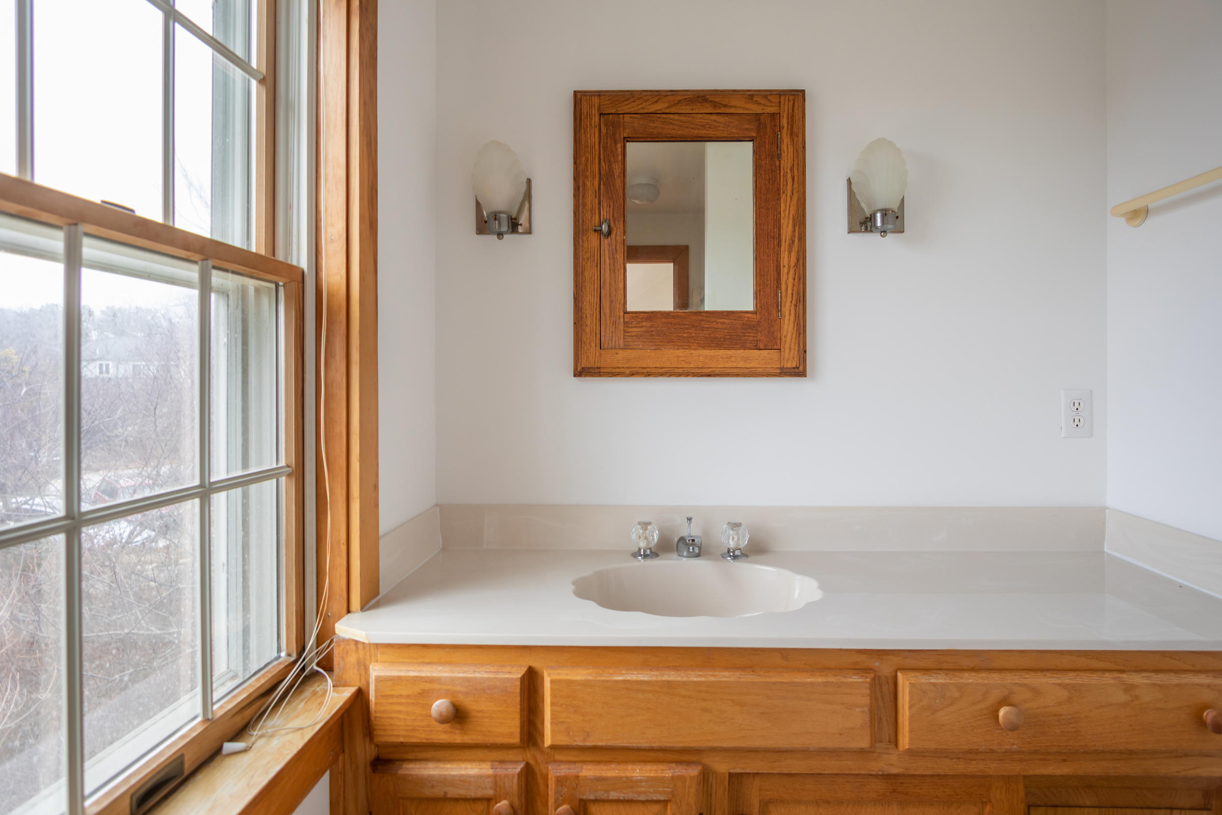 35 Bayberry Lane Eastham, MA 02642 - Photo 32 of 42 a bathroom with a sink and a mirror