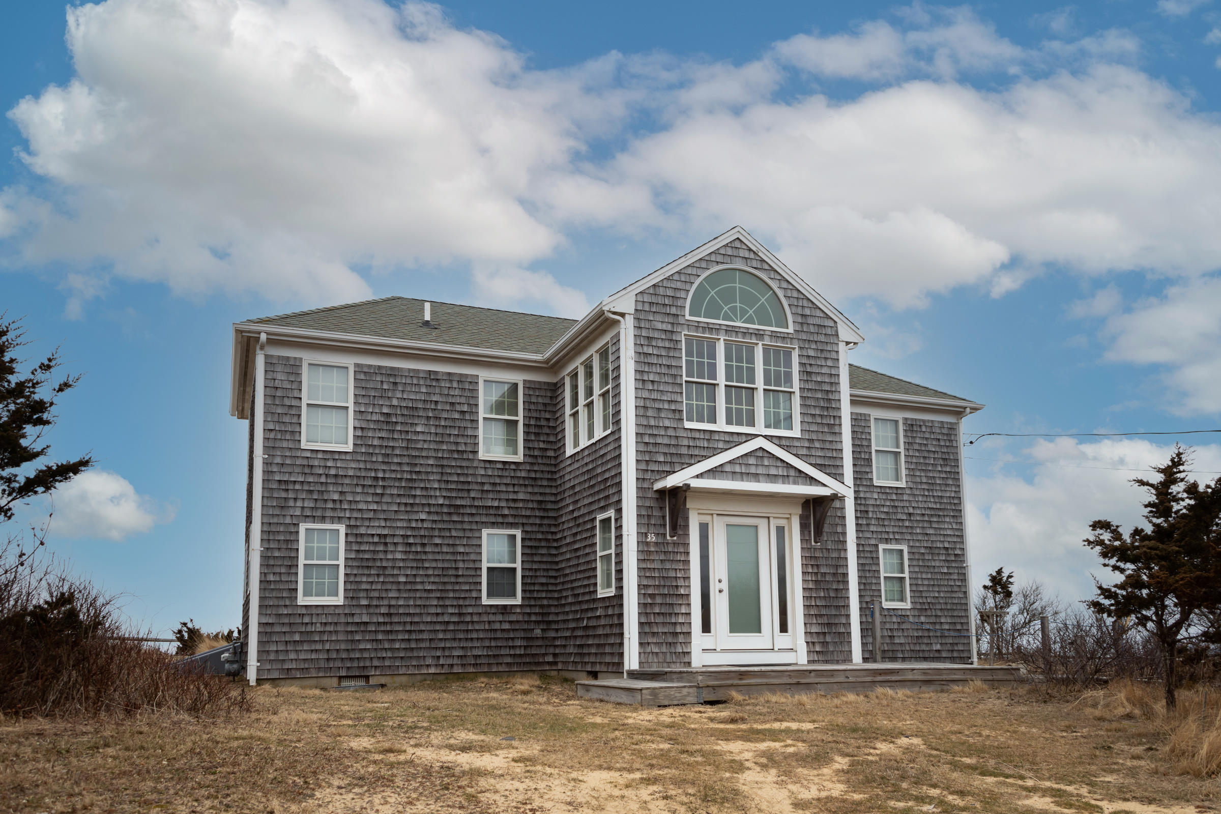 35 Bayberry Lane Eastham, MA 02642 - Photo 6 of 42 a front view of a house
