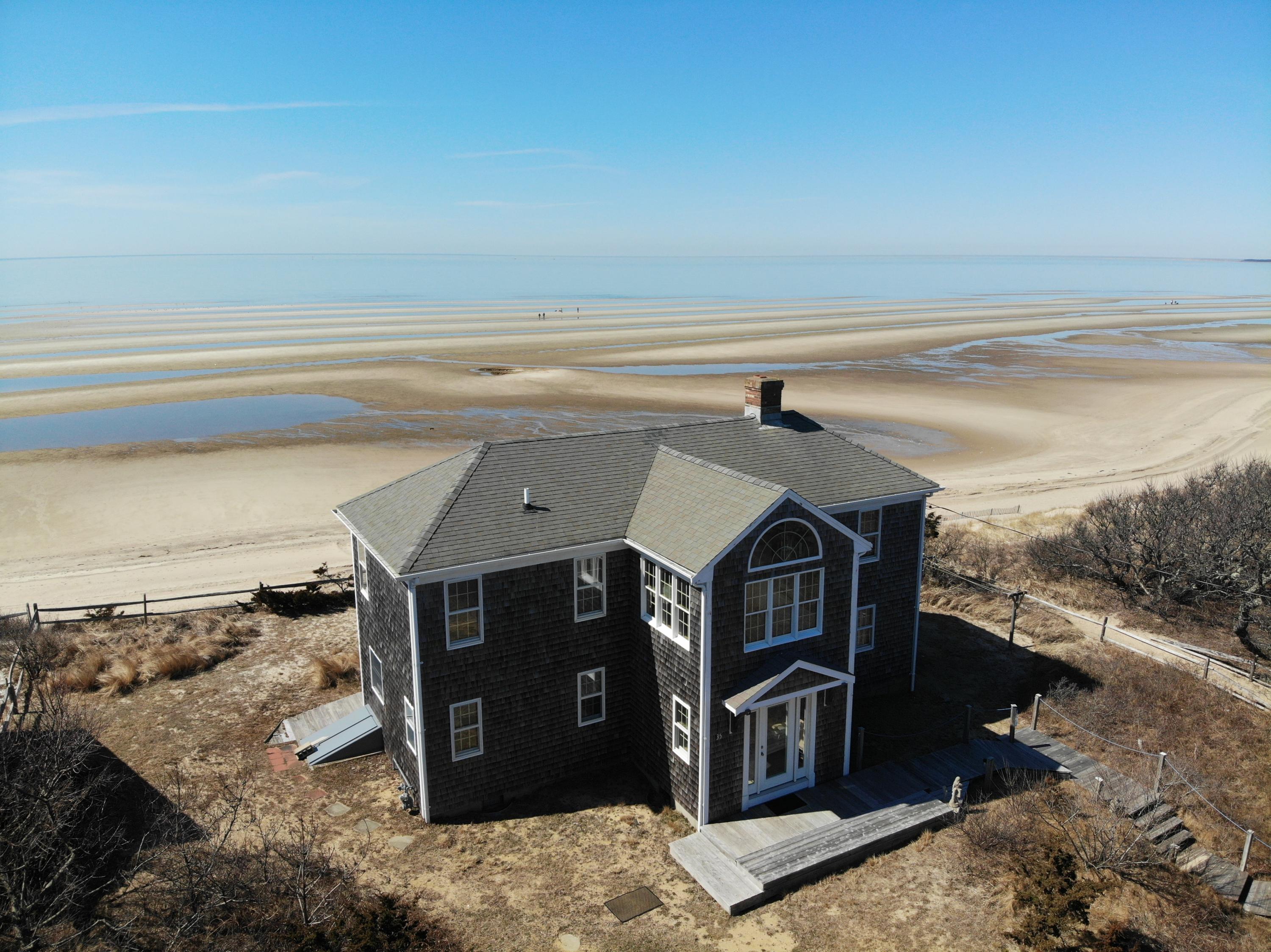 35 Bayberry Lane Eastham, MA 02642 - Photo 7 of 42 a view of a living room and utility room