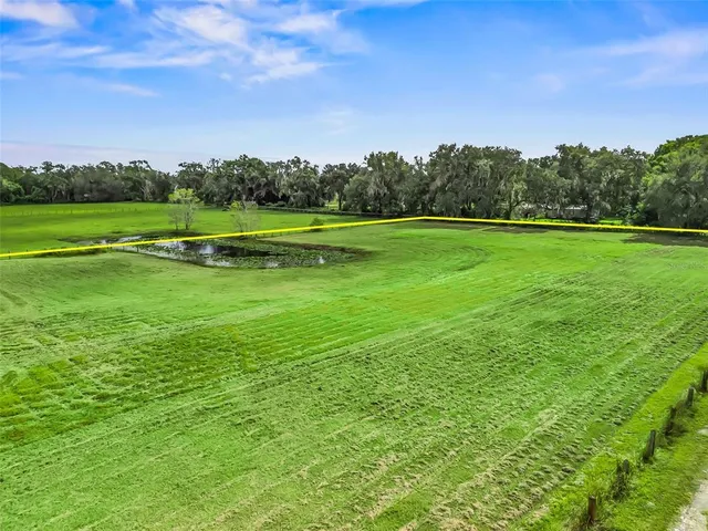 a view of a golf course with a garden
