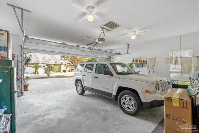 a view of a swimming pool with a yard and lake view