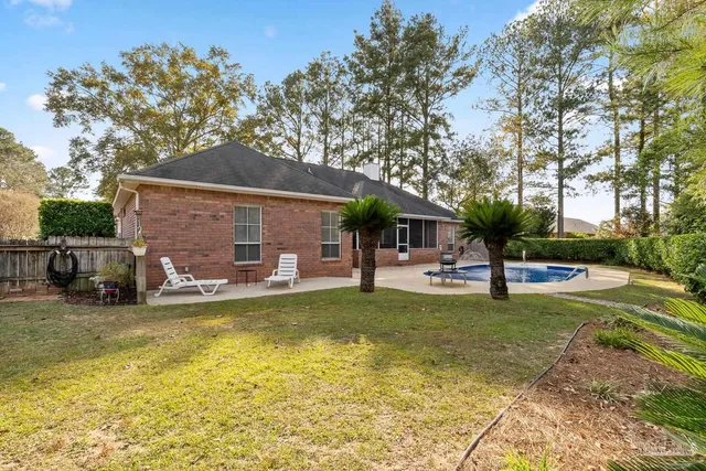 an aerial view of residential building and car parked