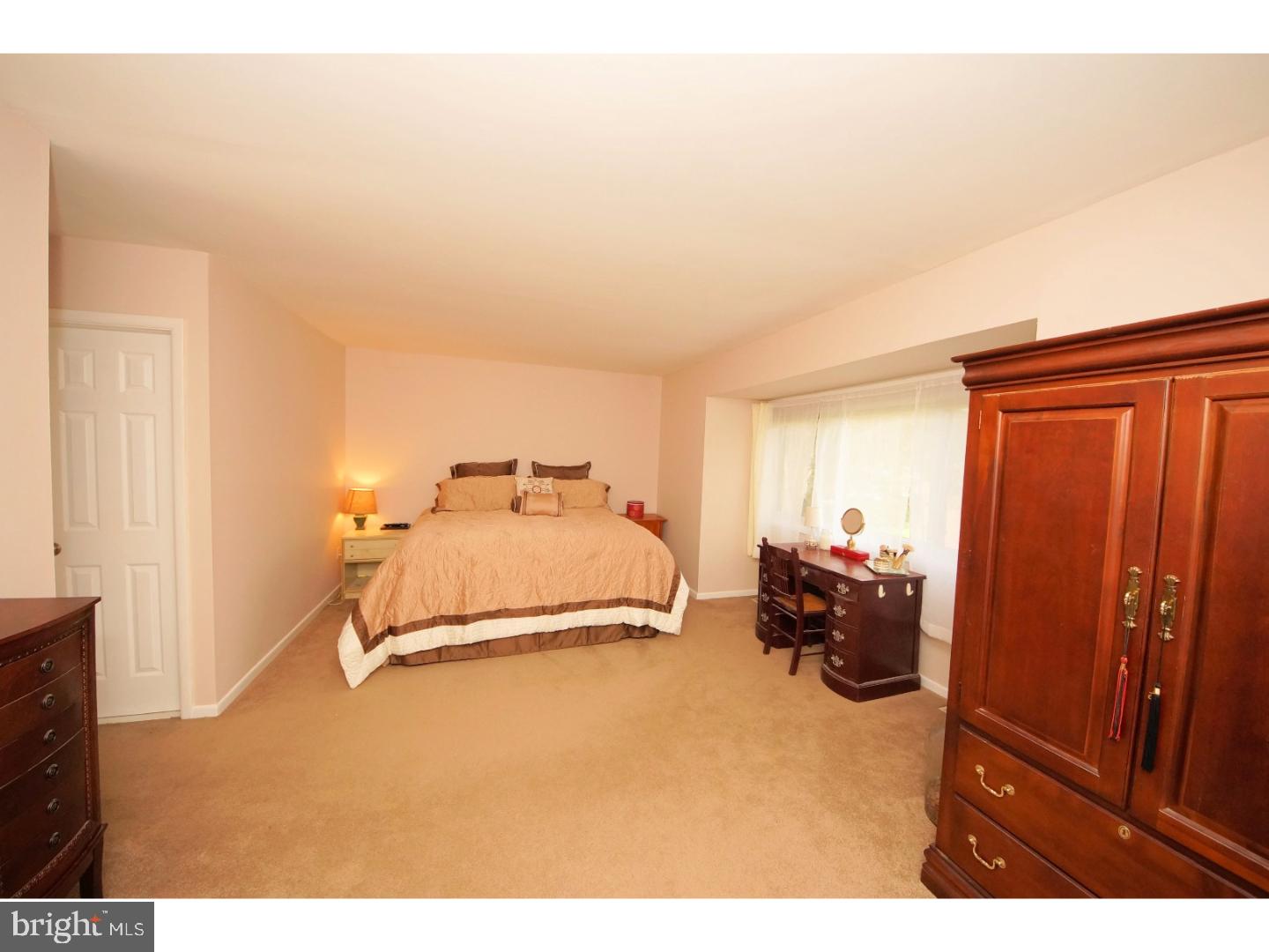 251 Probasco Road East Windsor, NJ 08520 - Photo 15 of 25 a bedroom with a bed and cabinets