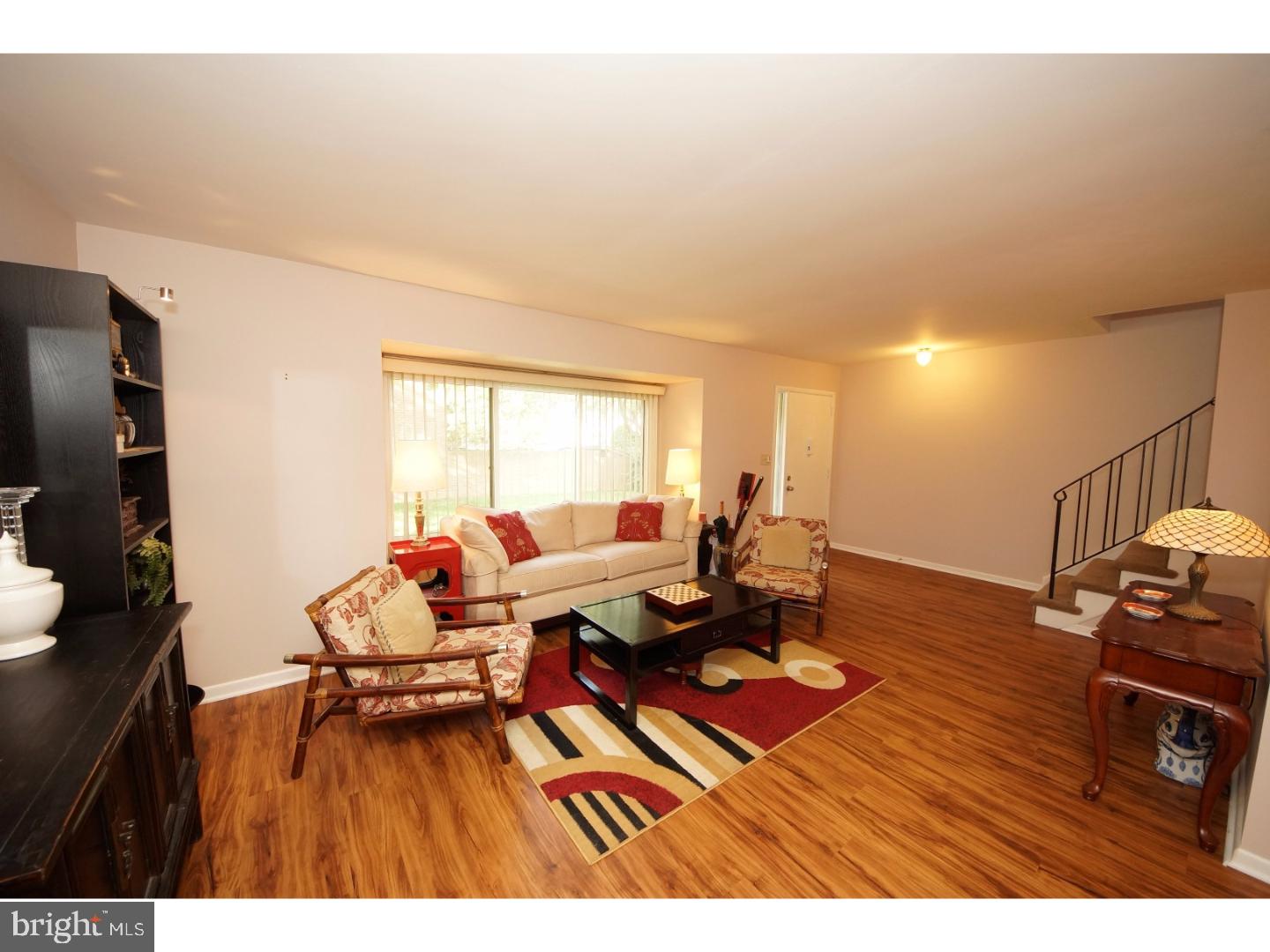 251 Probasco Road East Windsor, NJ 08520 - Photo 5 of 25 a living room with furniture and a flat screen tv