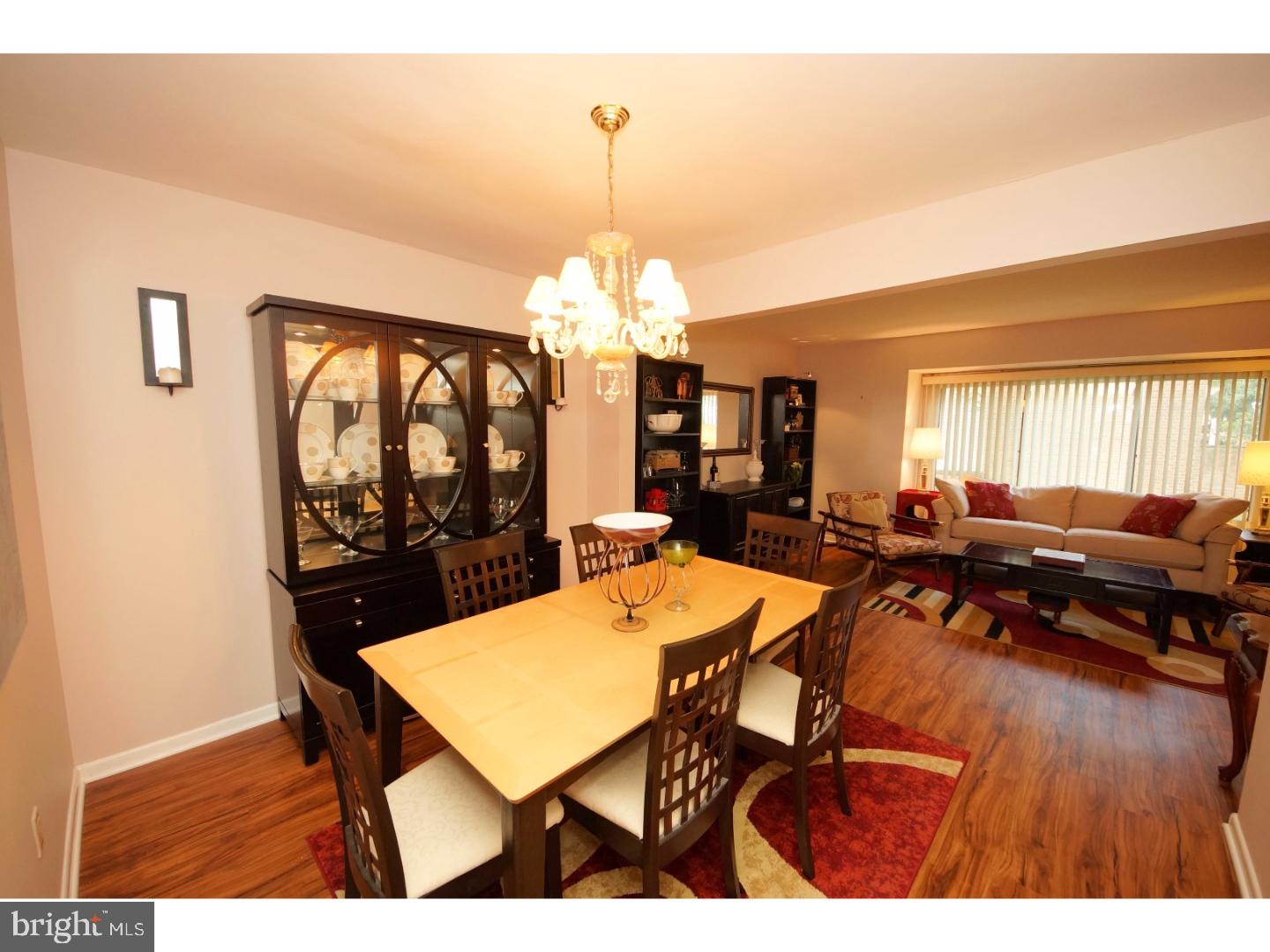 251 Probasco Road East Windsor, NJ 08520 - Photo 7 of 25 a view of a dining room with furniture and wooden floor