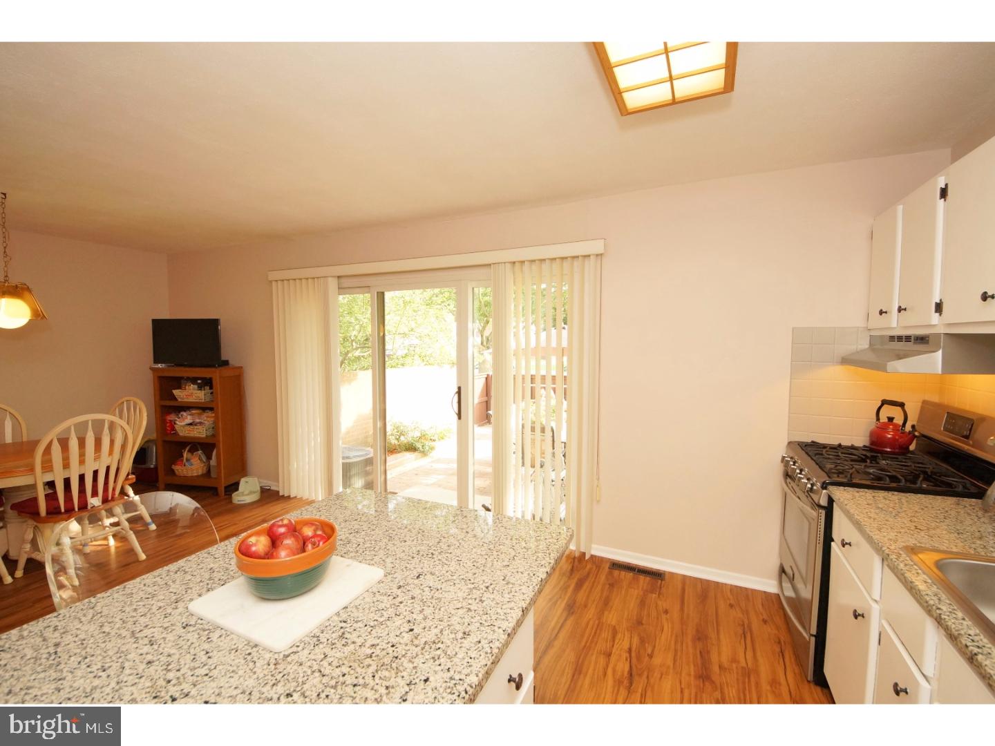 251 Probasco Road East Windsor, NJ 08520 - Photo 10 of 25 a kitchen that has a lot of cabinets a stove and a refrigerator