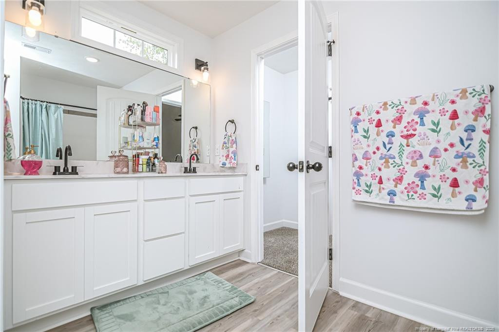 265 St Matthew Ch Road Raeford, NC 28376 - Photo 13 of 21 a bathroom with a sink and a mirror