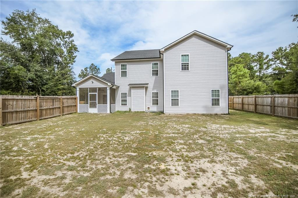 265 St Matthew Ch Road Raeford, NC 28376 - Photo 21 of 21 a view of a house with a yard and garage