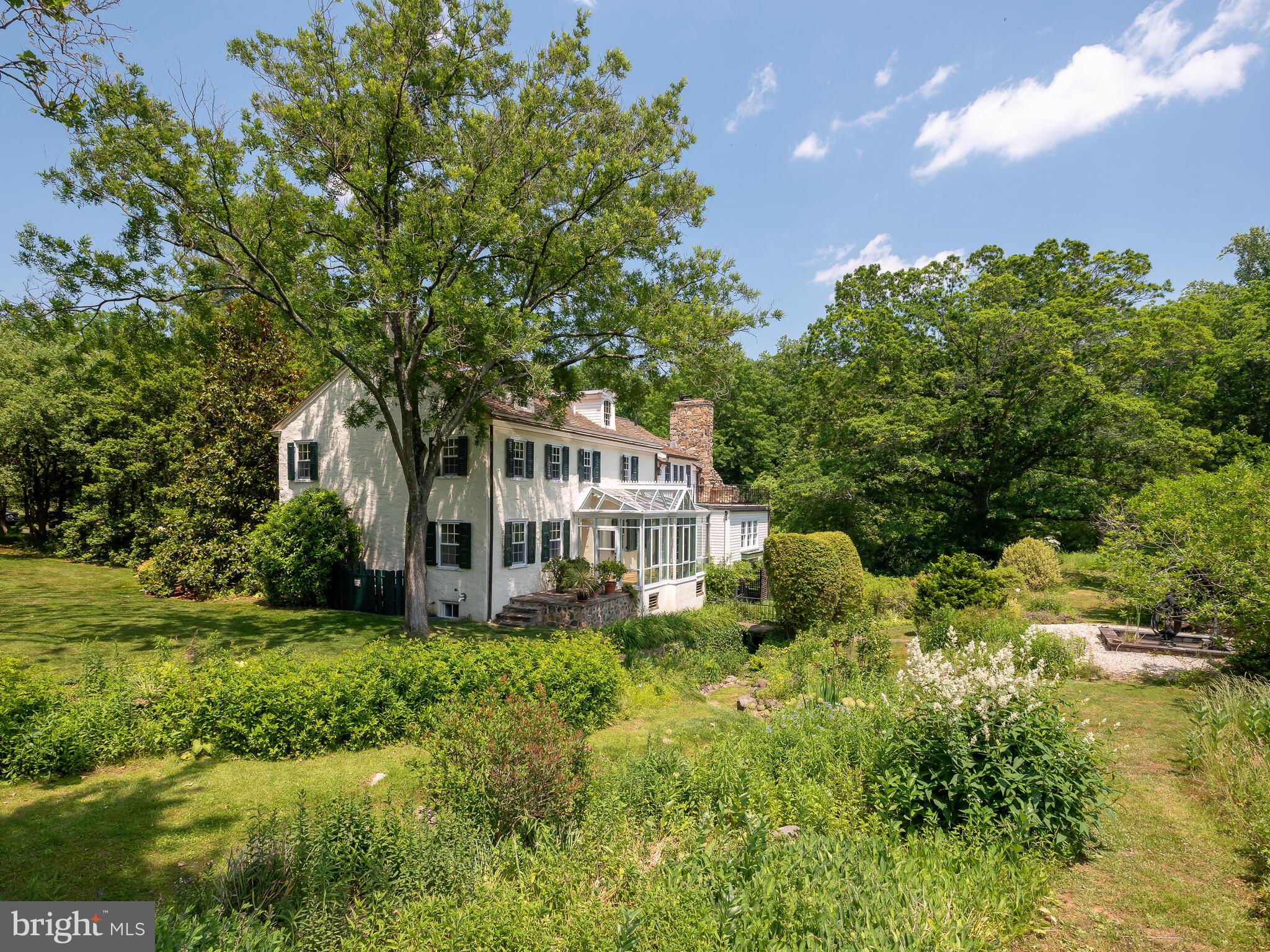 9 Marlborough Road Newtown Square, PA 19073 - Photo 5 of 83 Back Facade w/Solarium, Terraces & Meadow