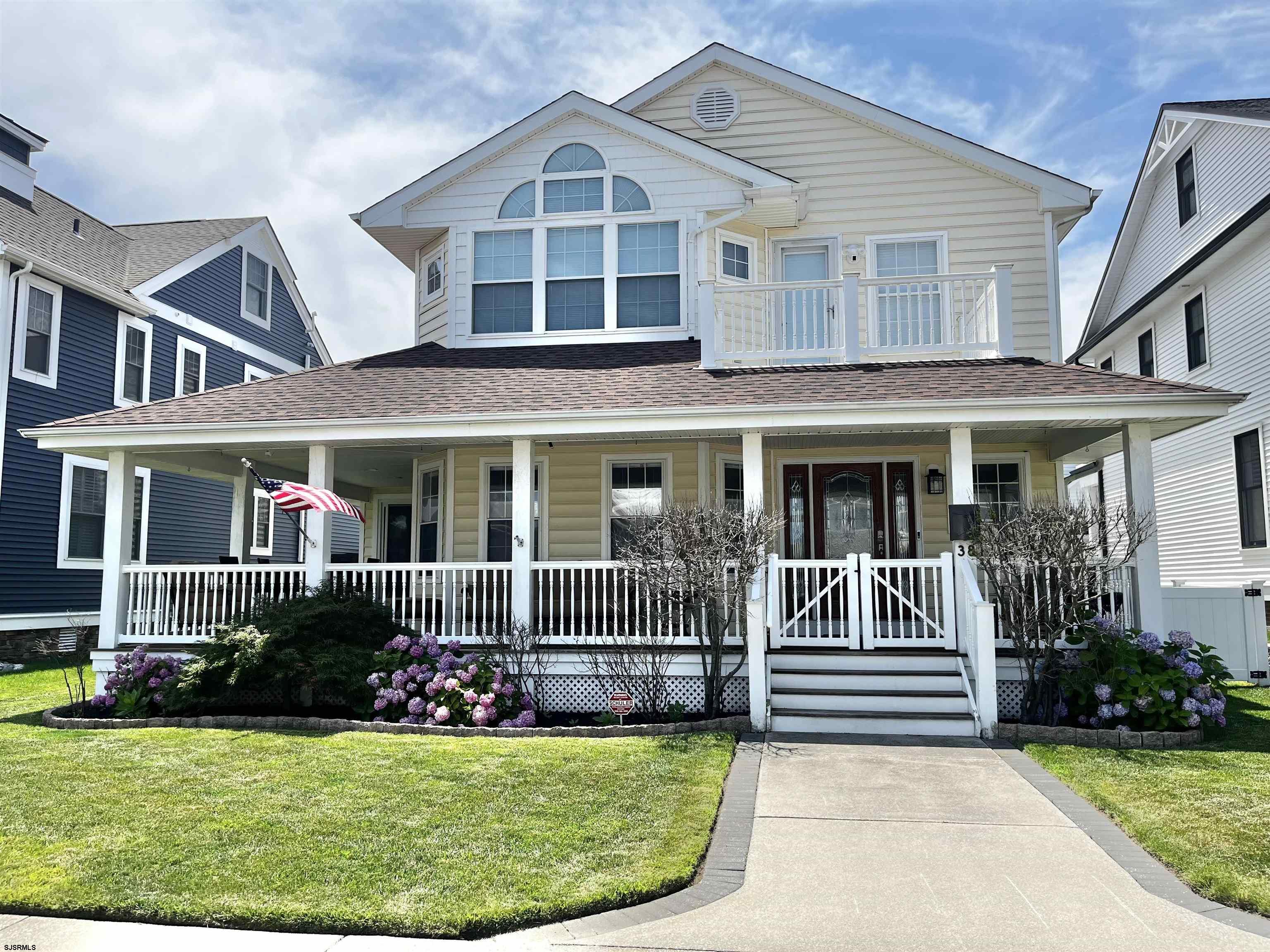 38 Walnut Road Ocean City, NJ 08226 - Photo 1 of 37 front view of a house with a yard