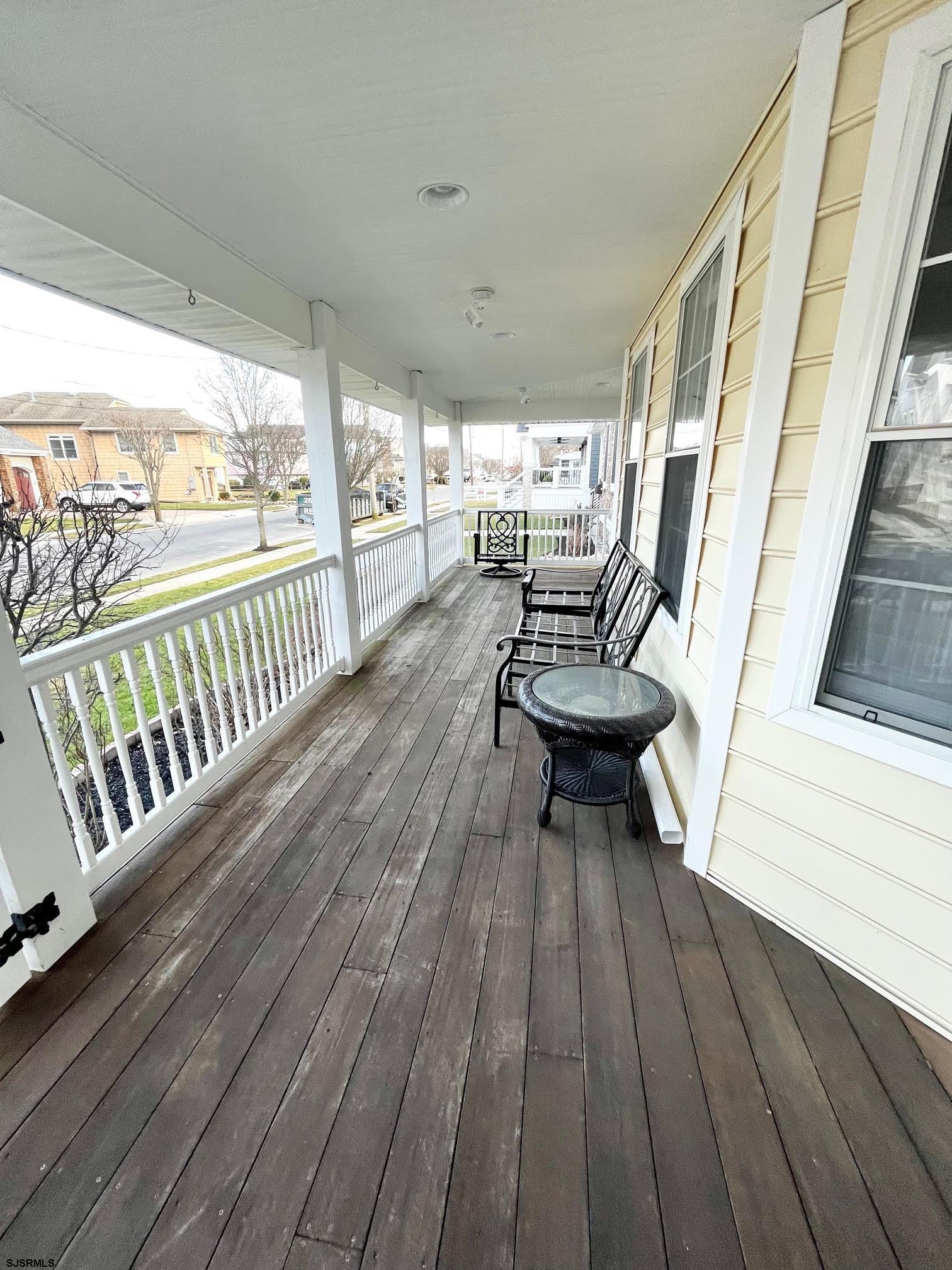 38 Walnut Road Ocean City, NJ 08226 - Photo 2 of 37 a view of a chairs on the roof deck