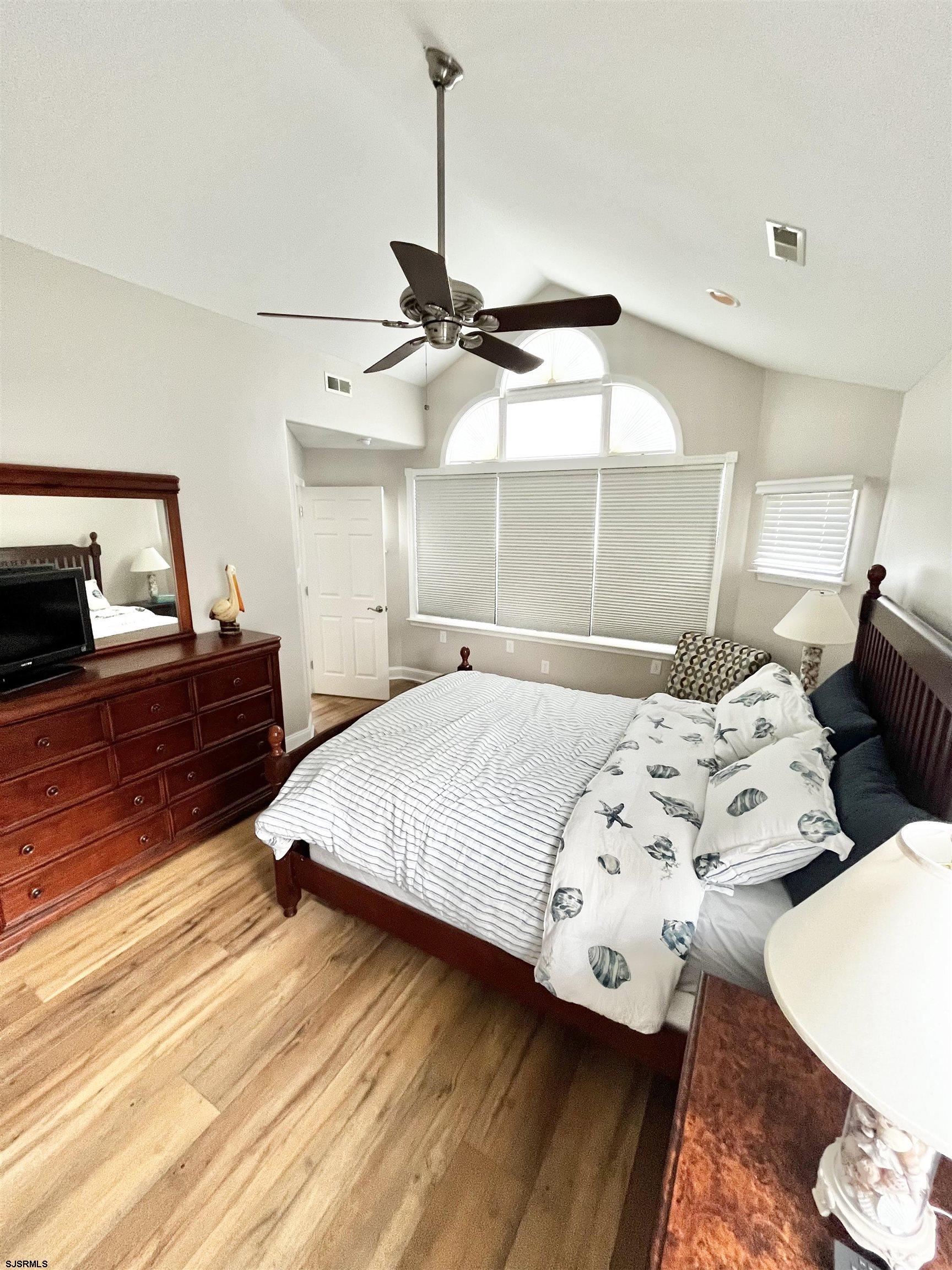 38 Walnut Road Ocean City, NJ 08226 - Photo 24 of 37 a bedroom with a bed and window