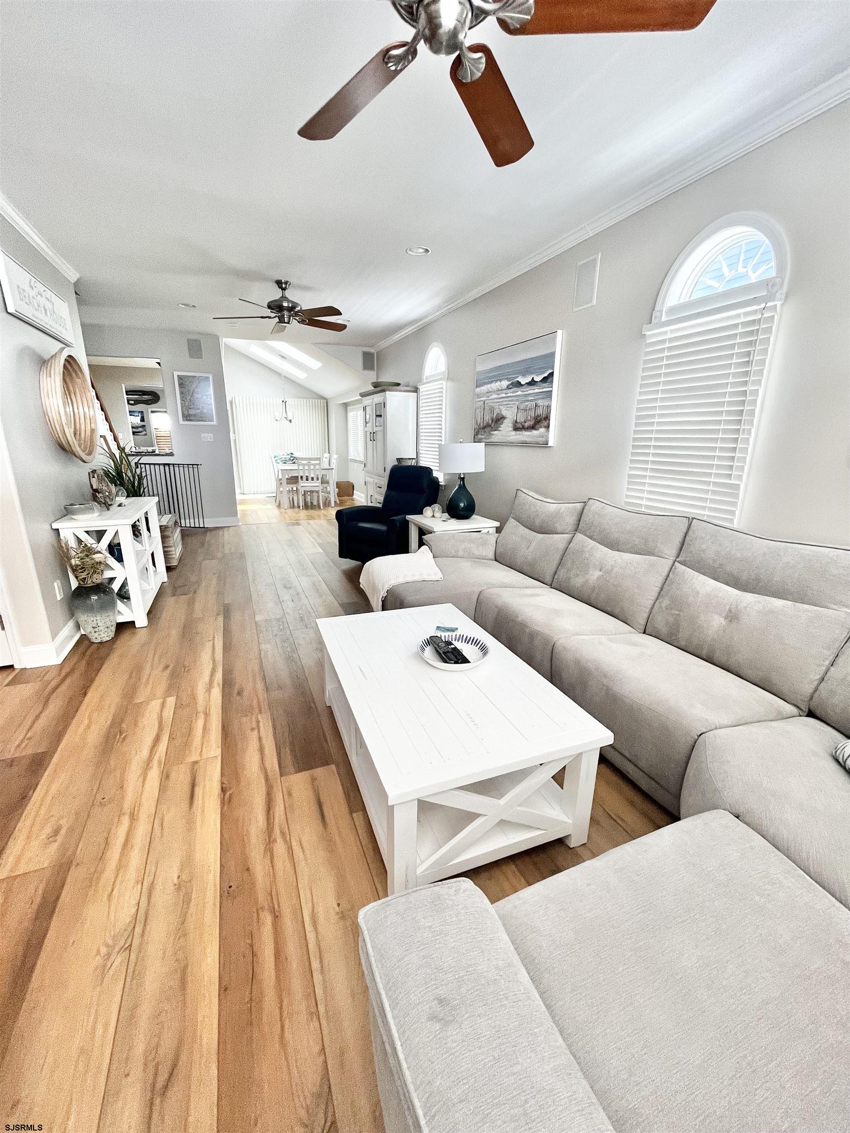 38 Walnut Road Ocean City, NJ 08226 - Photo 10 of 37 a living room with furniture and a wooden floor