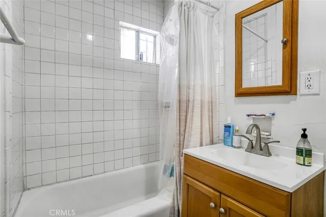 a bathroom with a sink and a bathtub