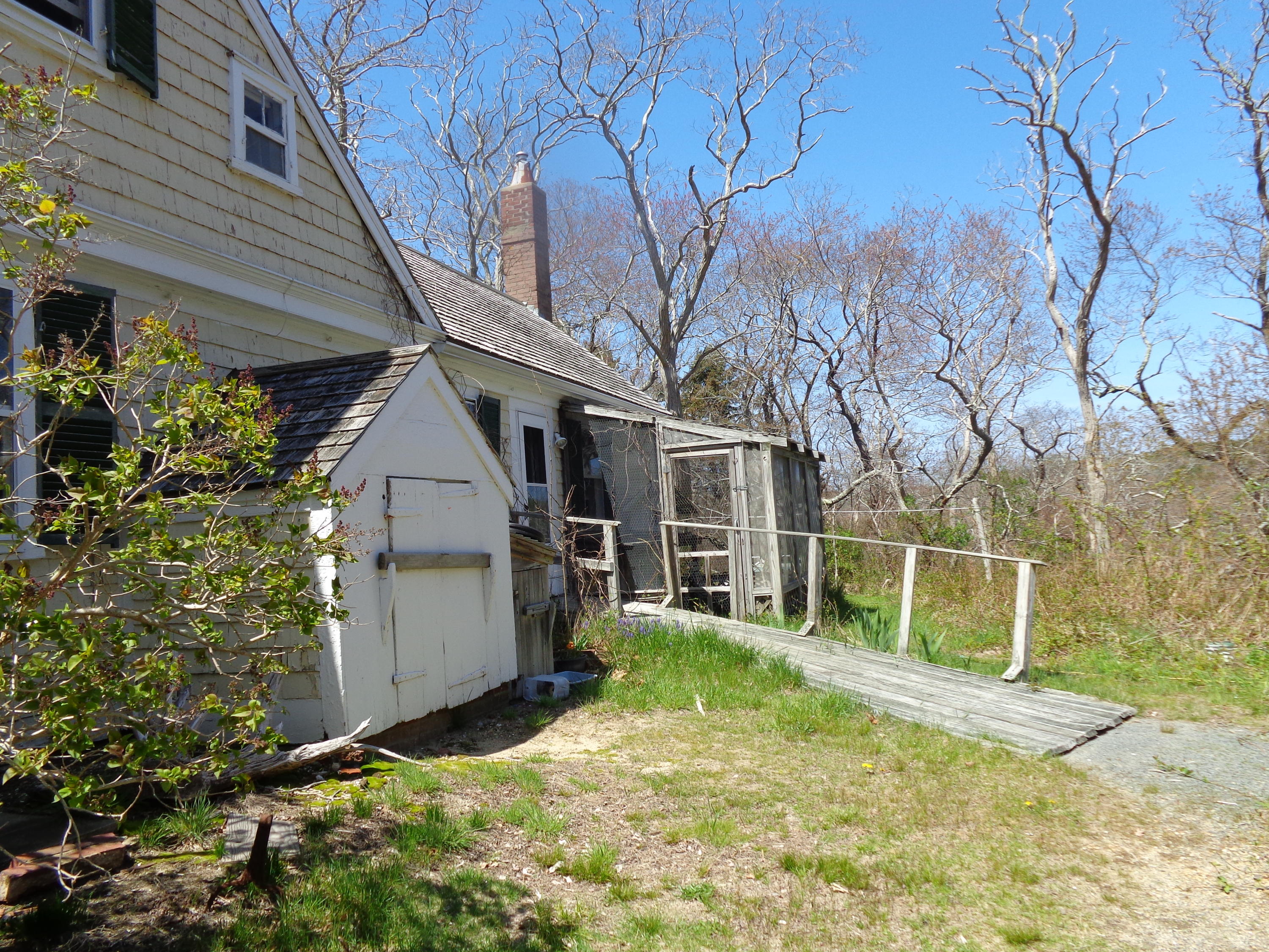 6 Holsbery Road Truro, MA 02666 - Photo 4 of 33 a view of a house with a yard