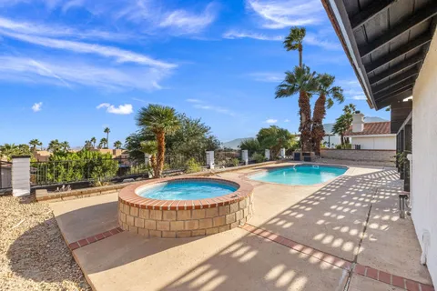 a view of outdoor space with swimming pool