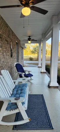 a room with furniture and a flat screen tv