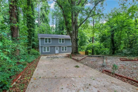 front view of a house with a yard