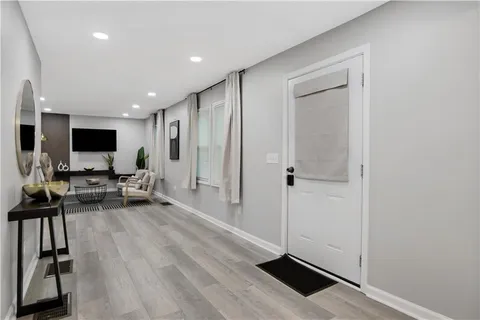 a view of a hallway with staircase