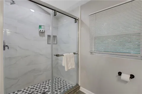 a view of hallway with washer and dryer