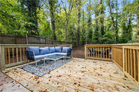 a view of roof deck with chairs