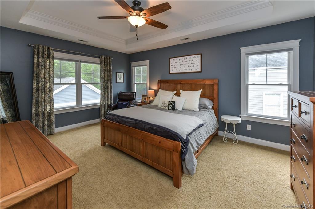 413 Esther Court Fort Mill, SC 29708 - Photo 23 of 28 a spacious bedroom with a bed and window