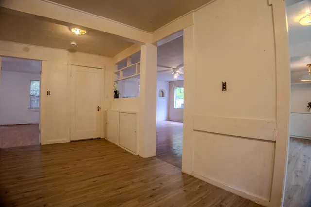 a kitchen with stainless steel appliances and wooden cabinets