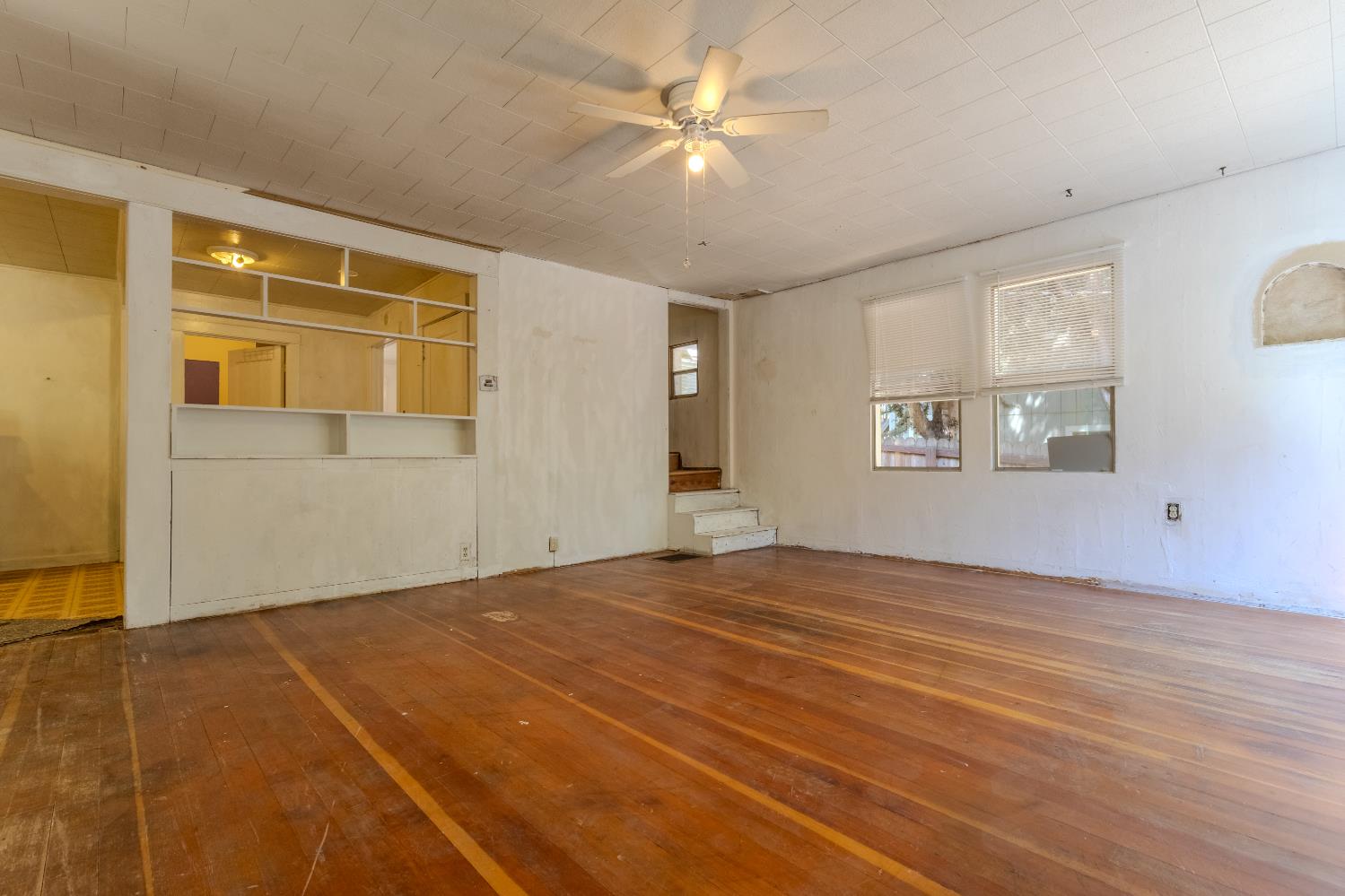 2896 Clay Street Placerville, CA 95667 - Photo 15 of 38 a view of an empty room with a window and wooden floor