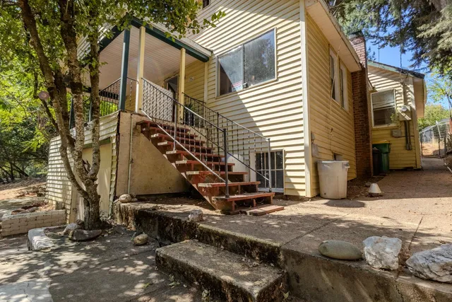 a view of a house with a park