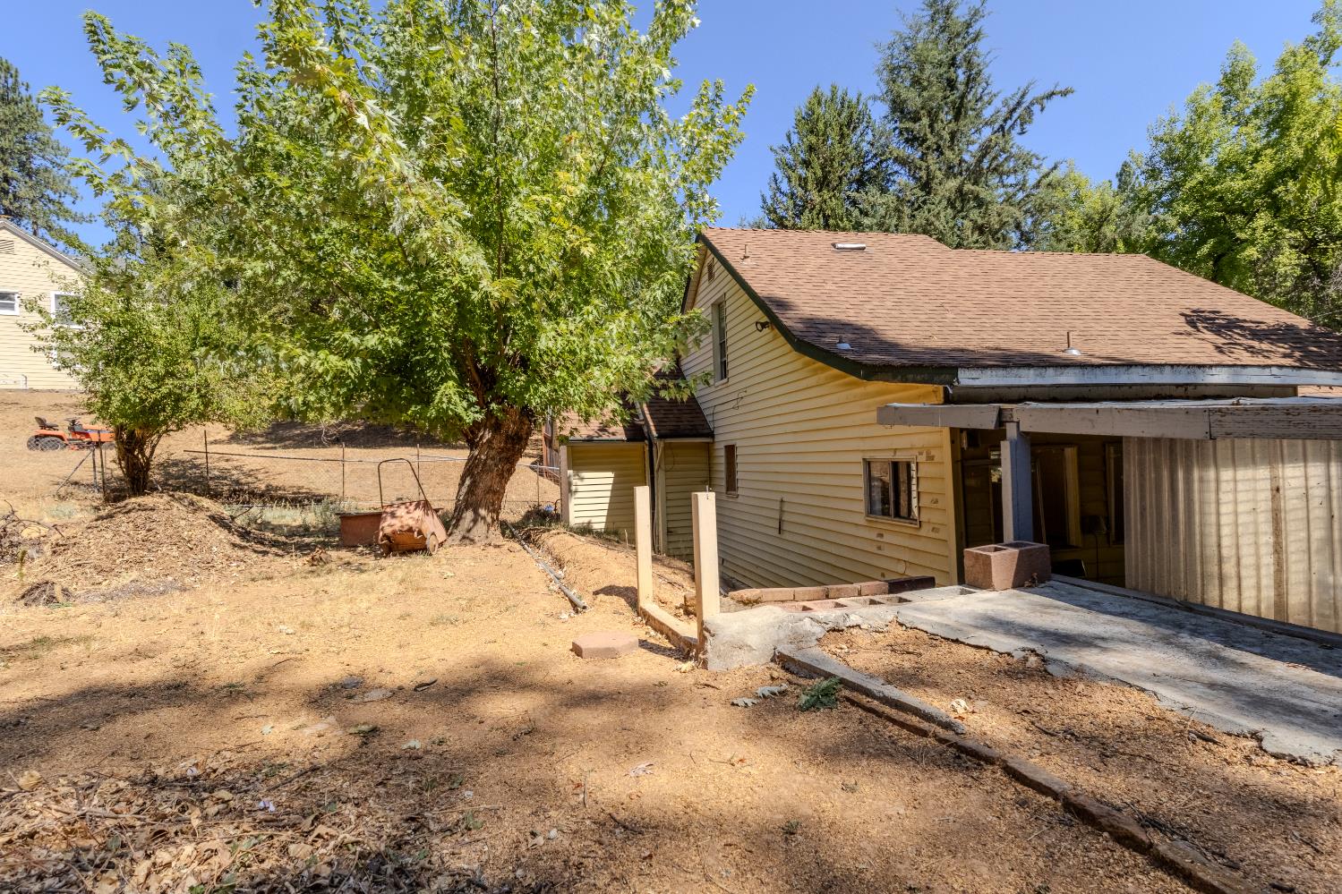 2896 Clay Street Placerville, CA 95667 - Photo 26 of 38 a view of a house with a yard covered in snow