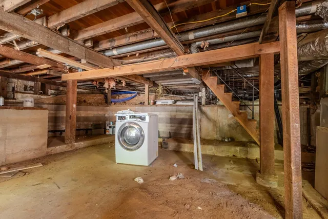 a bathroom with a shower and a toilet
