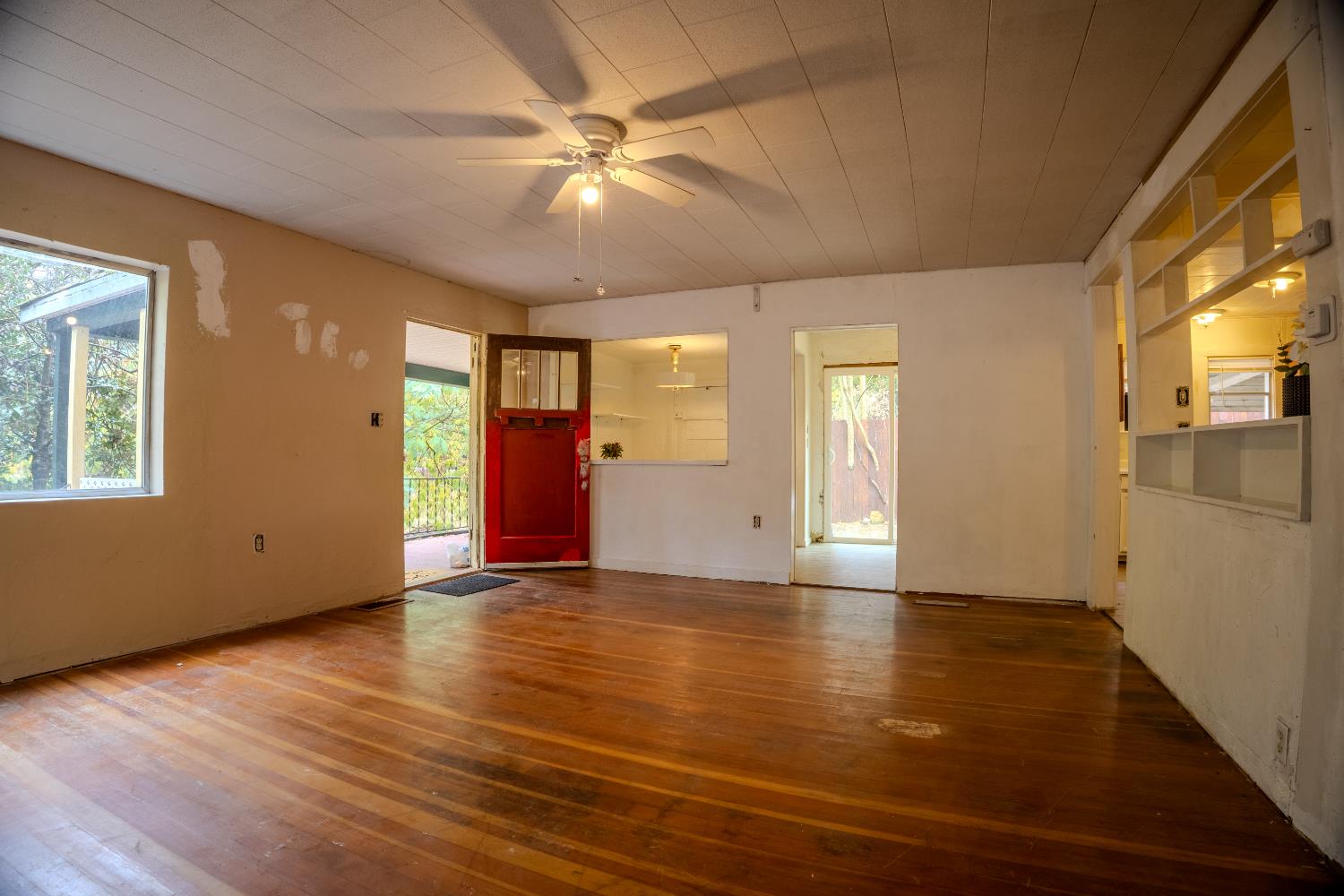 2896 Clay Street Placerville, CA 95667 - Photo 7 of 38 a view of an empty room with window and wooden floor