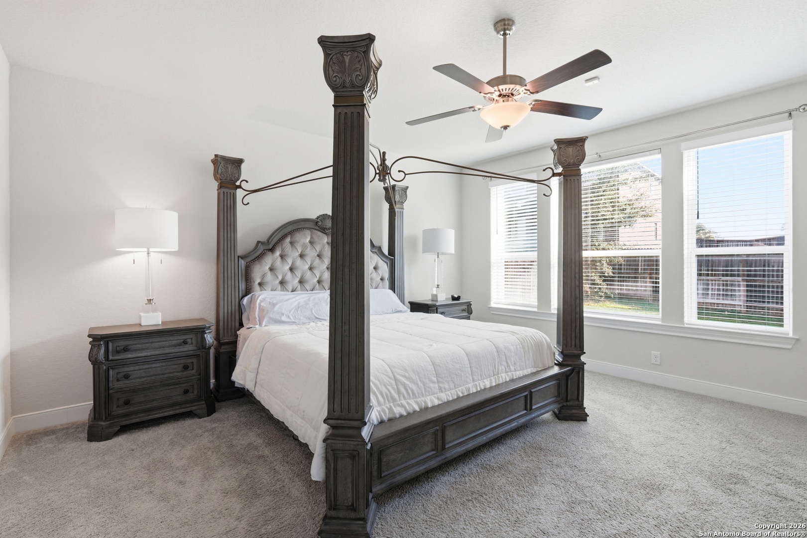 8334 Two Winds San Antonio, TX 78255 - Photo 15 of 39 a bed sitting in a spacious bedroom next to a window