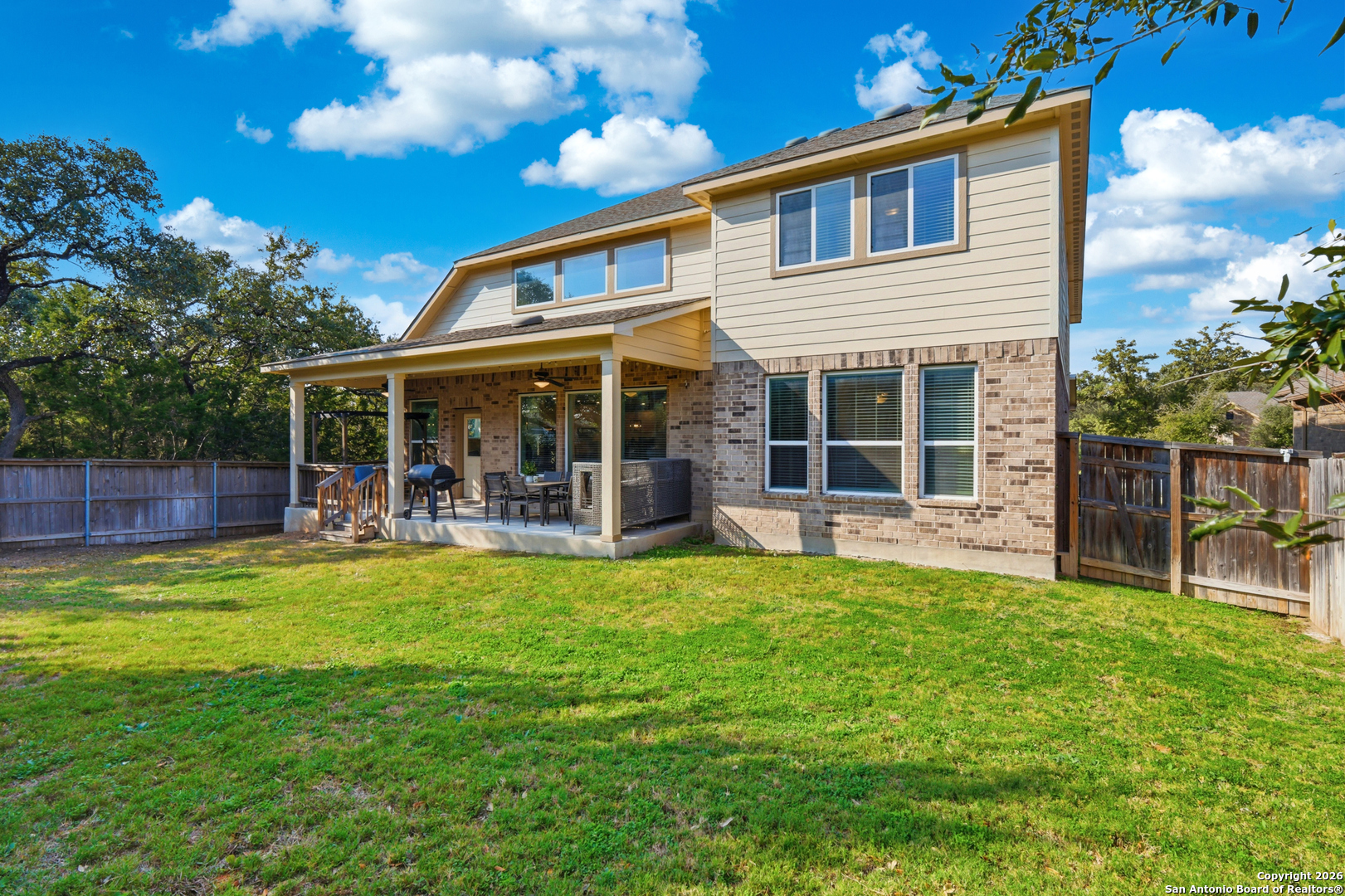 8334 Two Winds San Antonio, TX 78255 - Photo 27 of 39 a view of a house with a yard porch and sitting area