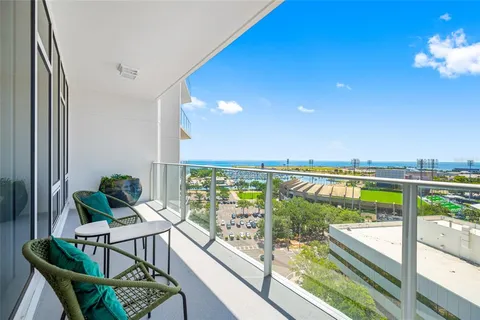 a view of balcony with furniture