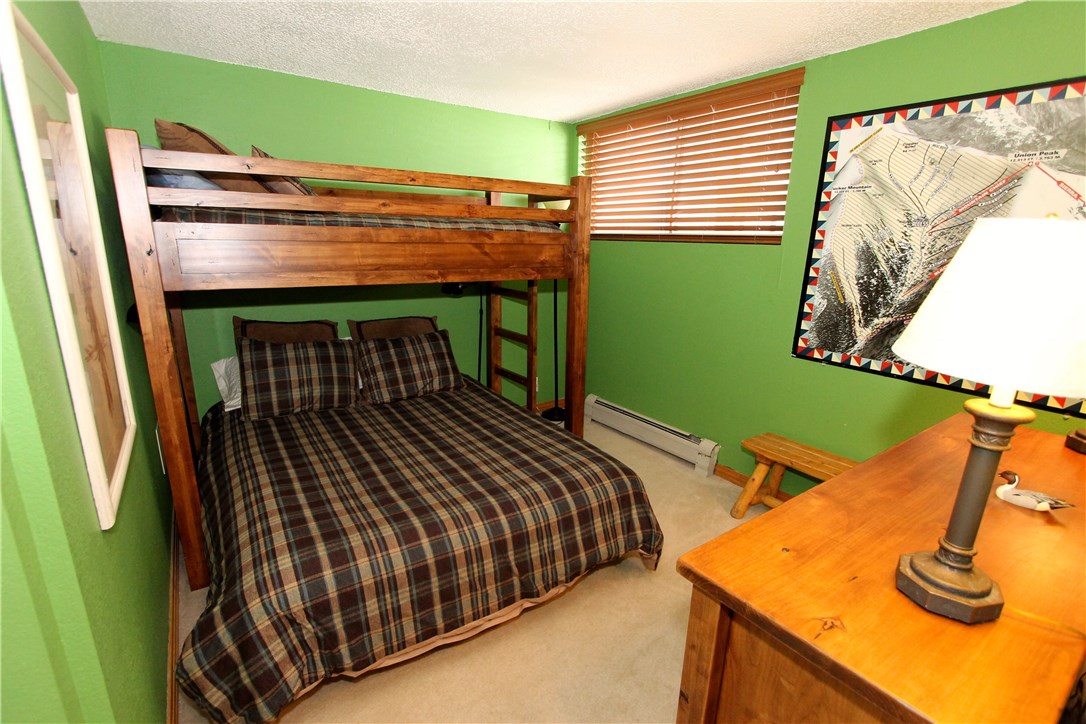 760 Copper Road, Unit 106 Copper Mountain, CO 80443 - Photo 17 of 23 Bunks in Guest Bedroom, with guest bath right across the hall.