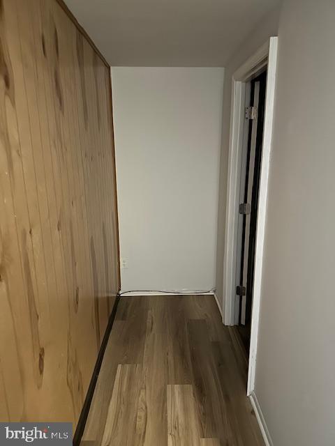 2411 Potterfield Road Windsor Mill, MD 21244 - Photo 22 of 28 a view of a room with wooden floor and staircase