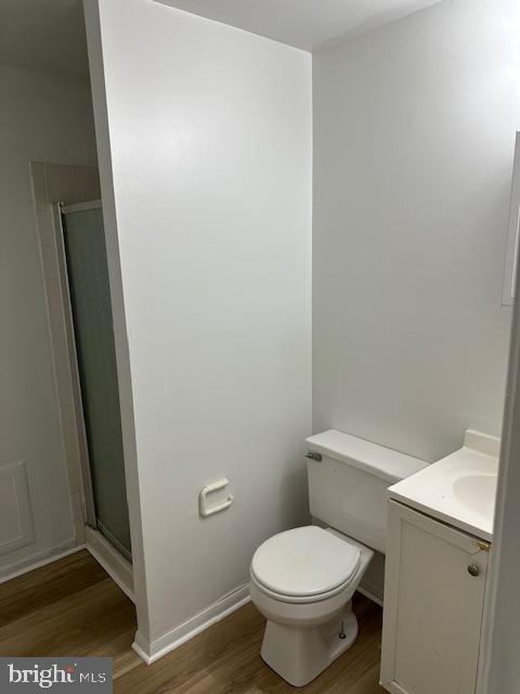 2411 Potterfield Road Windsor Mill, MD 21244 - Photo 24 of 28 a white toilet sitting next to a shower