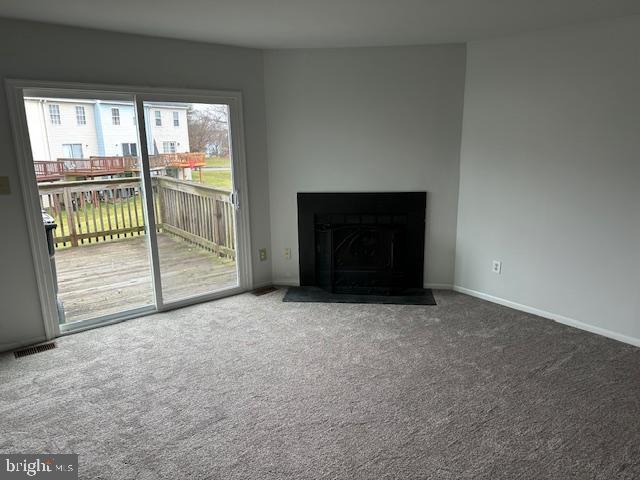 2411 Potterfield Road Windsor Mill, MD 21244 - Photo 5 of 28 a view of an empty room with a fireplace