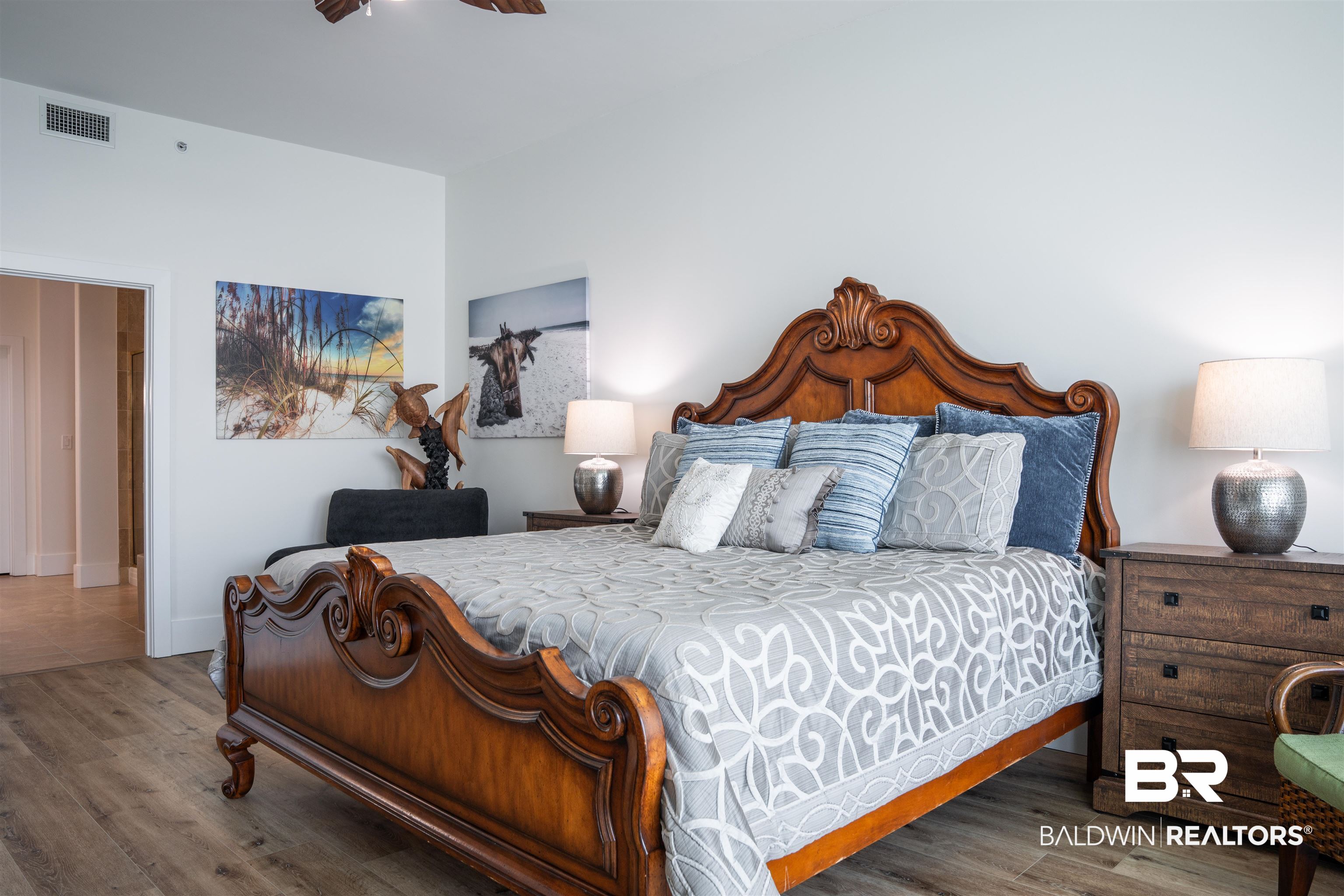 28107 Perdido Beach Boulevard, Unit DPH05 Orange Beach, AL 36561 - Photo 11 of 43 Bedroom featuring wood finished floors and a ceiling fan