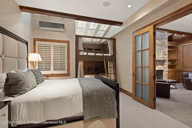 a bathroom with a double vanity sink mirror and