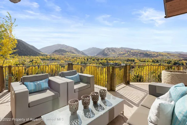 a view of city from terrace with seating space