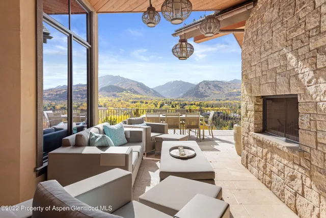 a view of balcony with furniture
