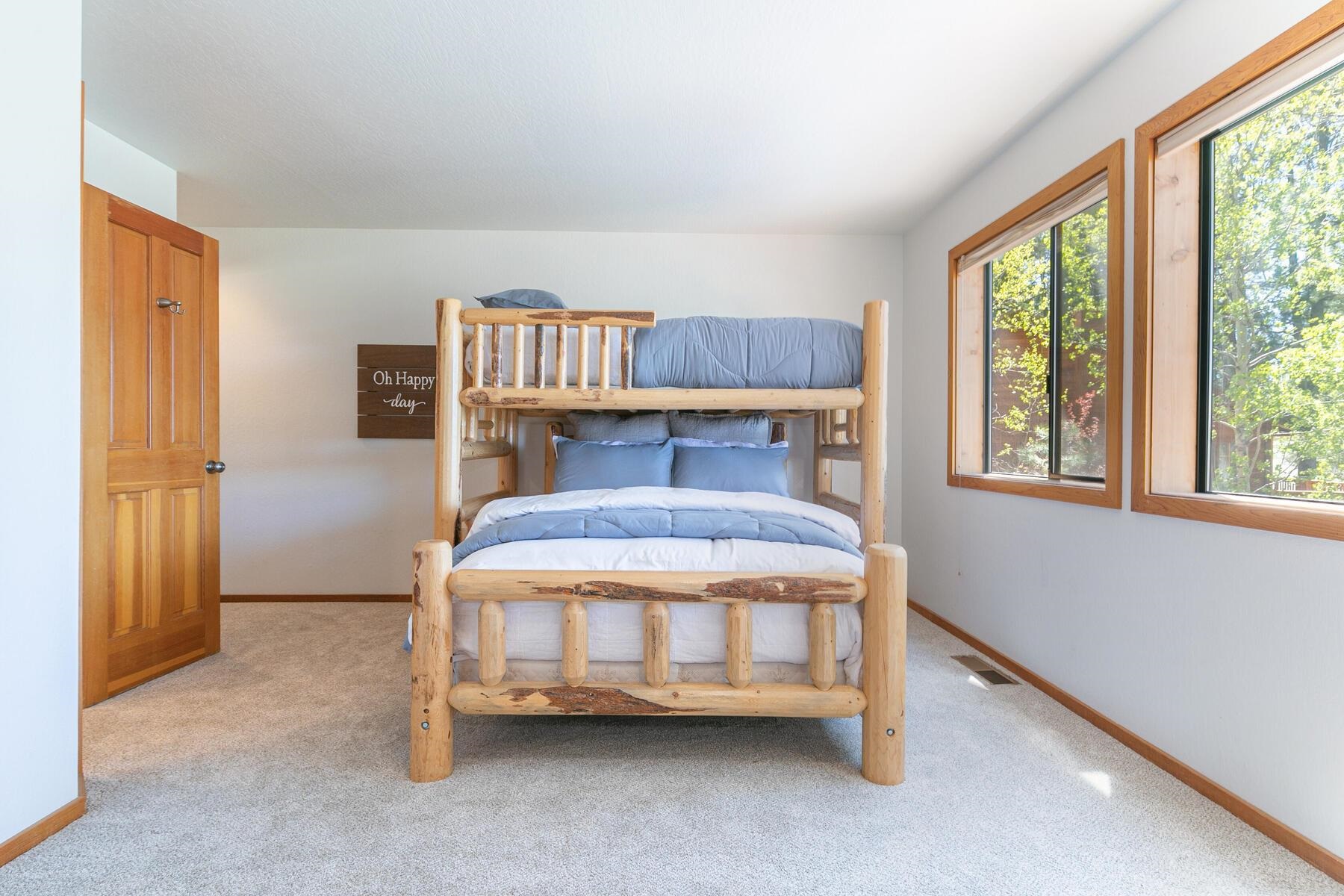 397 Skidder Trail Truckee, CA 96161 - Photo 14 of 21 a bedroom with a bed table and a window