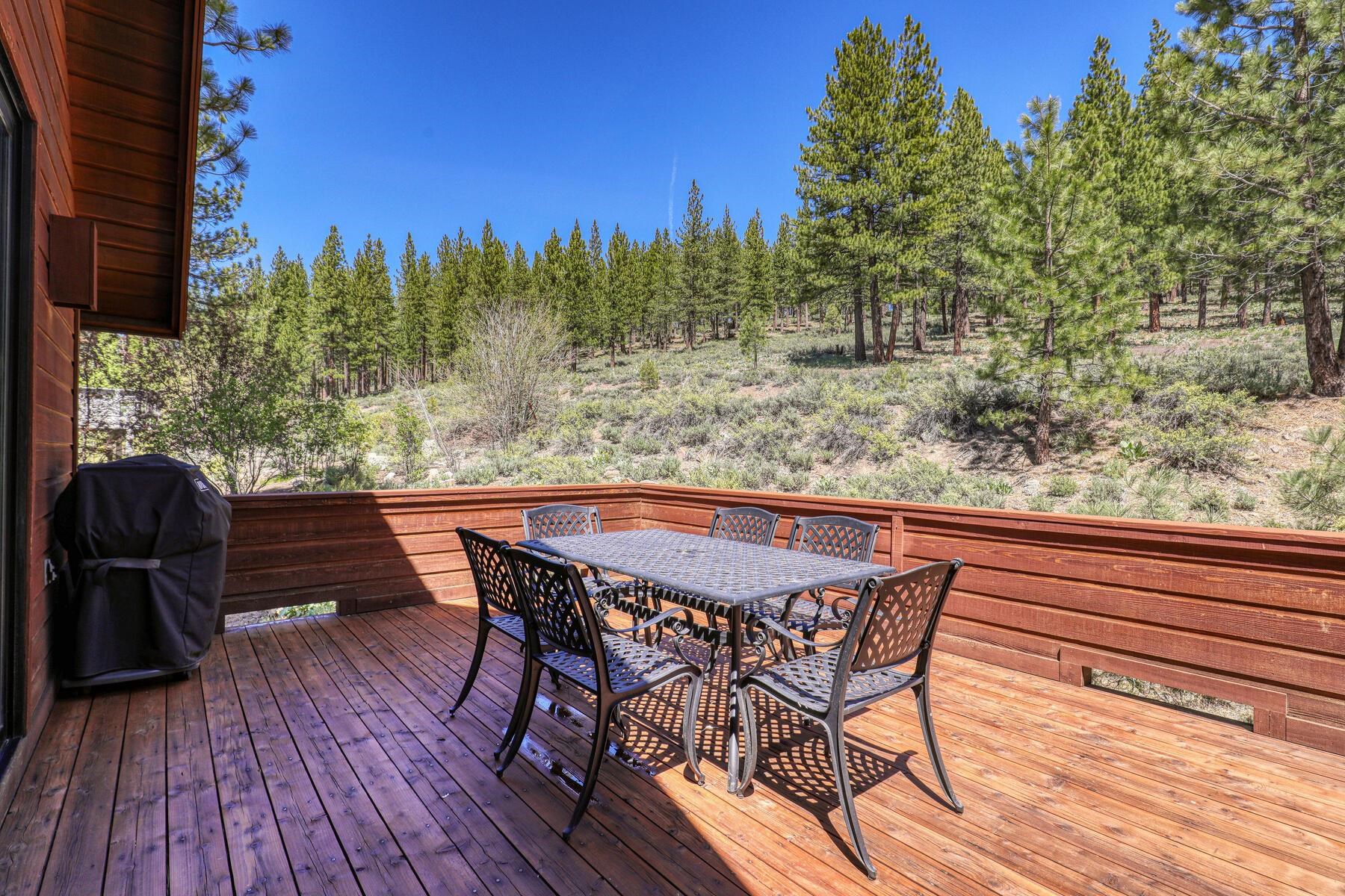397 Skidder Trail Truckee, CA 96161 - Photo 18 of 21 a view of a chairs and table on the wooden floor