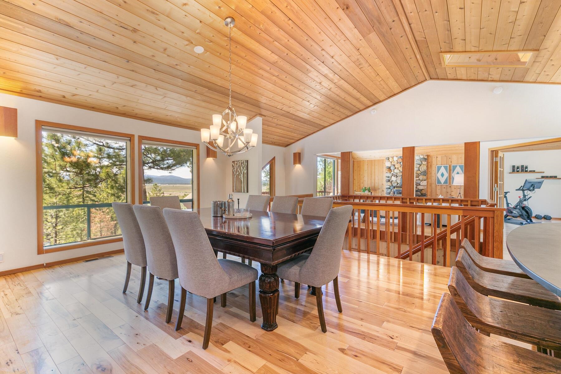 397 Skidder Trail Truckee, CA 96161 - Photo 6 of 21 a view of a dining room with furniture window and wooden floor