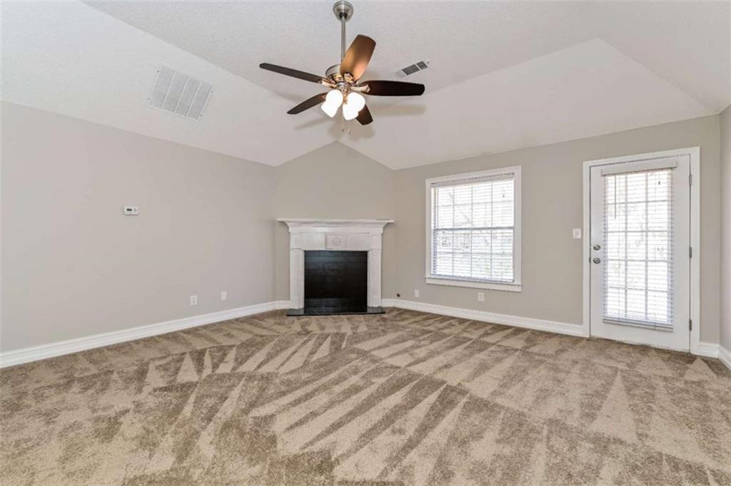 106 Emerald Lane Hampton, GA 30228 - Photo 11 of 19 a view of an empty room with a window