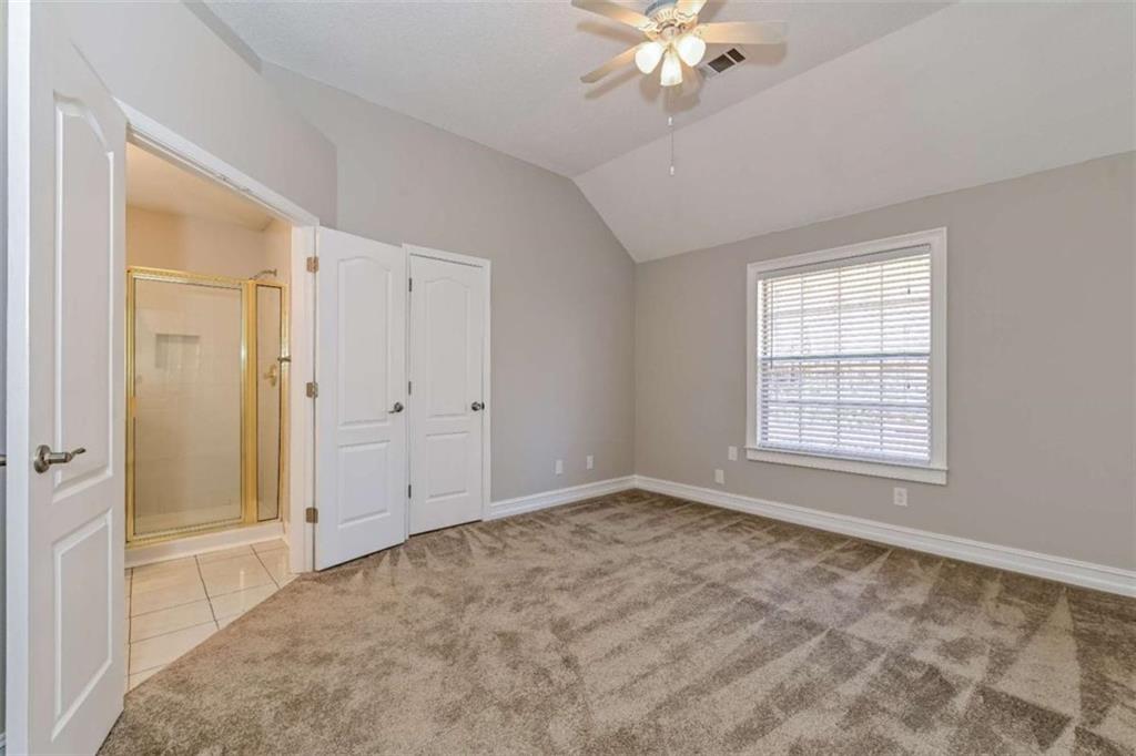 106 Emerald Lane Hampton, GA 30228 - Photo 18 of 19 a view of an empty room with a window