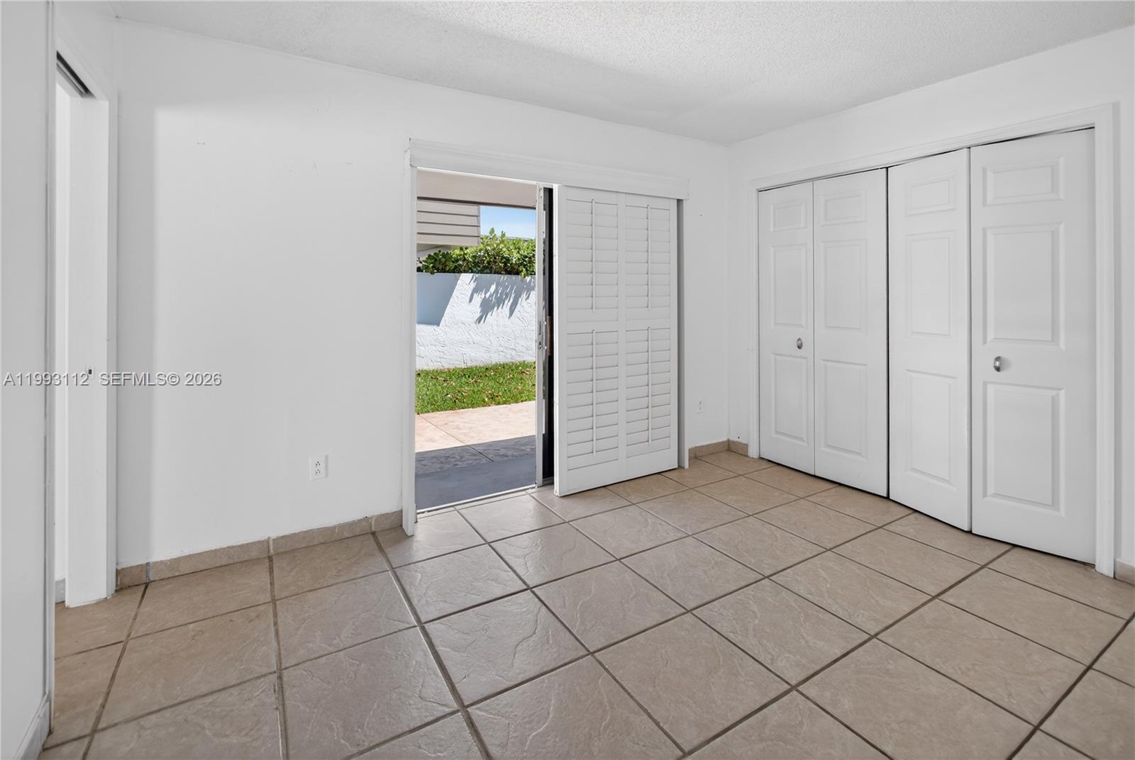 13471 Southwest 99th Terrace Miami, FL 33186 - Photo 29 of 44 a view of an empty room and window